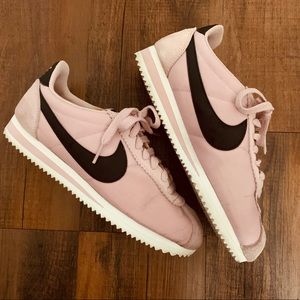 Pink and black nike Cortez